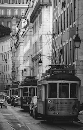 Historic black-and-white photo of downtown Atlanta with early 20th-century streetcars.