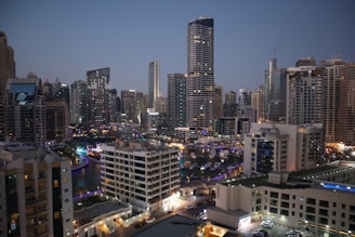 A panoramic view of Dubai's bustling marina at dusk.