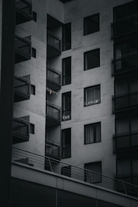 Modern new apartment building exterior with bright balconies