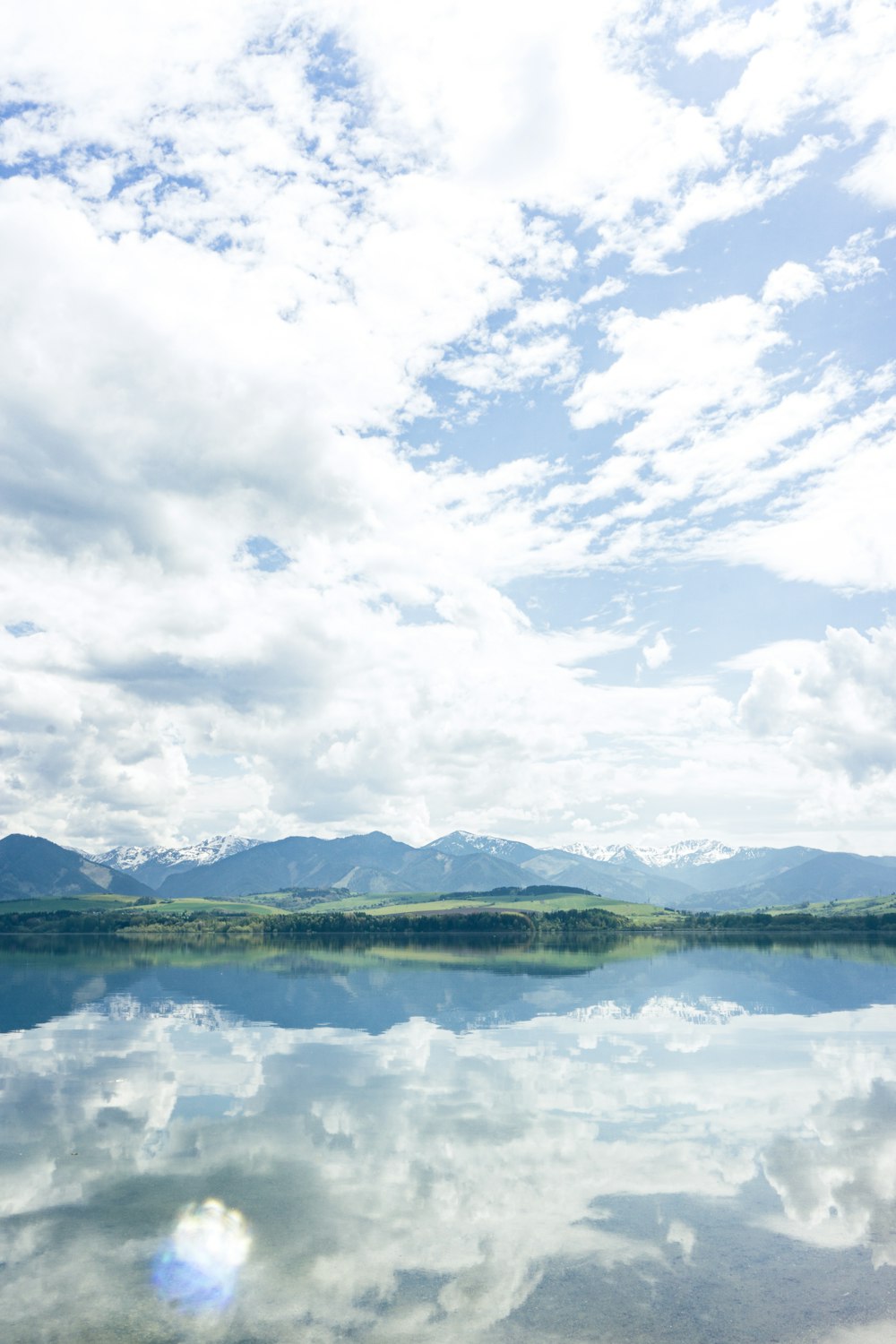 a large body of water surrounded by mountains