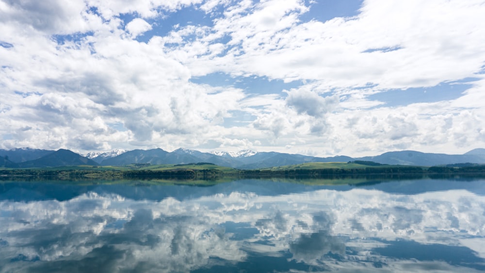 a large body of water surrounded by mountains