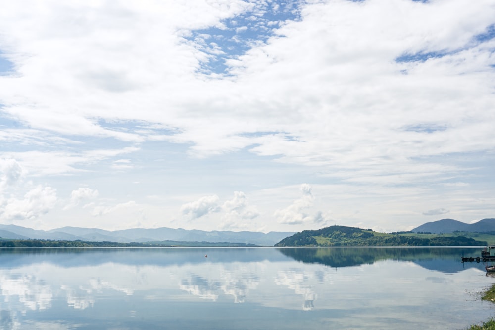 a large body of water surrounded by mountains