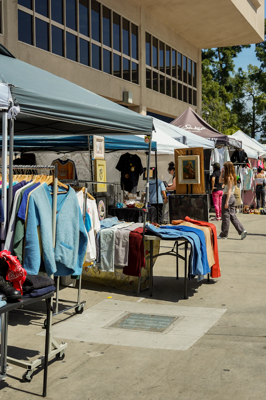 People browsing items at a local market