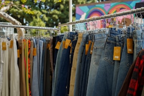 New arrivals rack featuring trendy clothes with clear price tags and local flavor