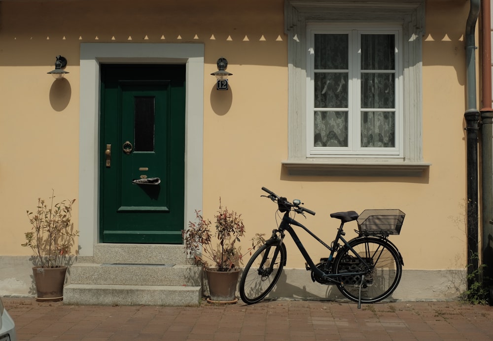 a bicycle is parked in front of a house