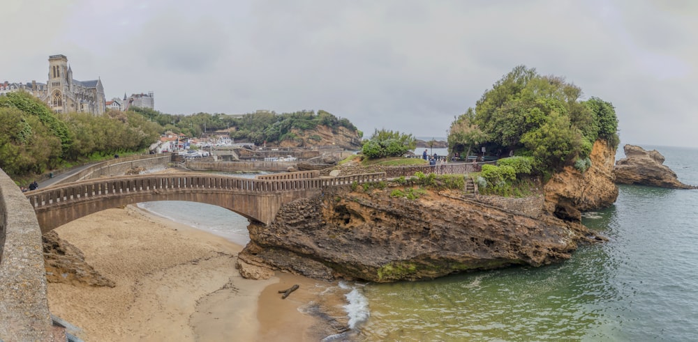 a stone bridge over a body of water