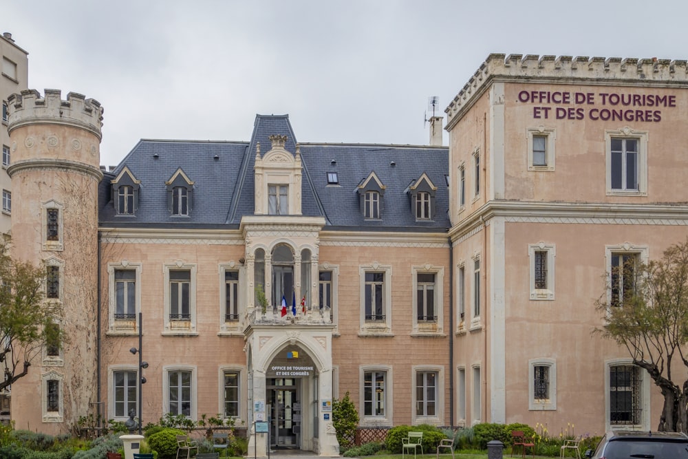 a large building with a car parked in front of it