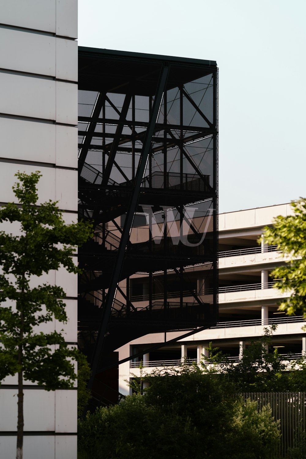 a tall building with a sign on the side of it