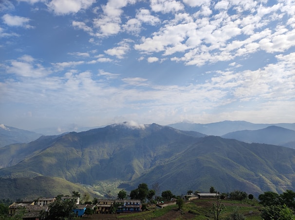 A picturesque view of Obsidian Farm nestled in the hills.