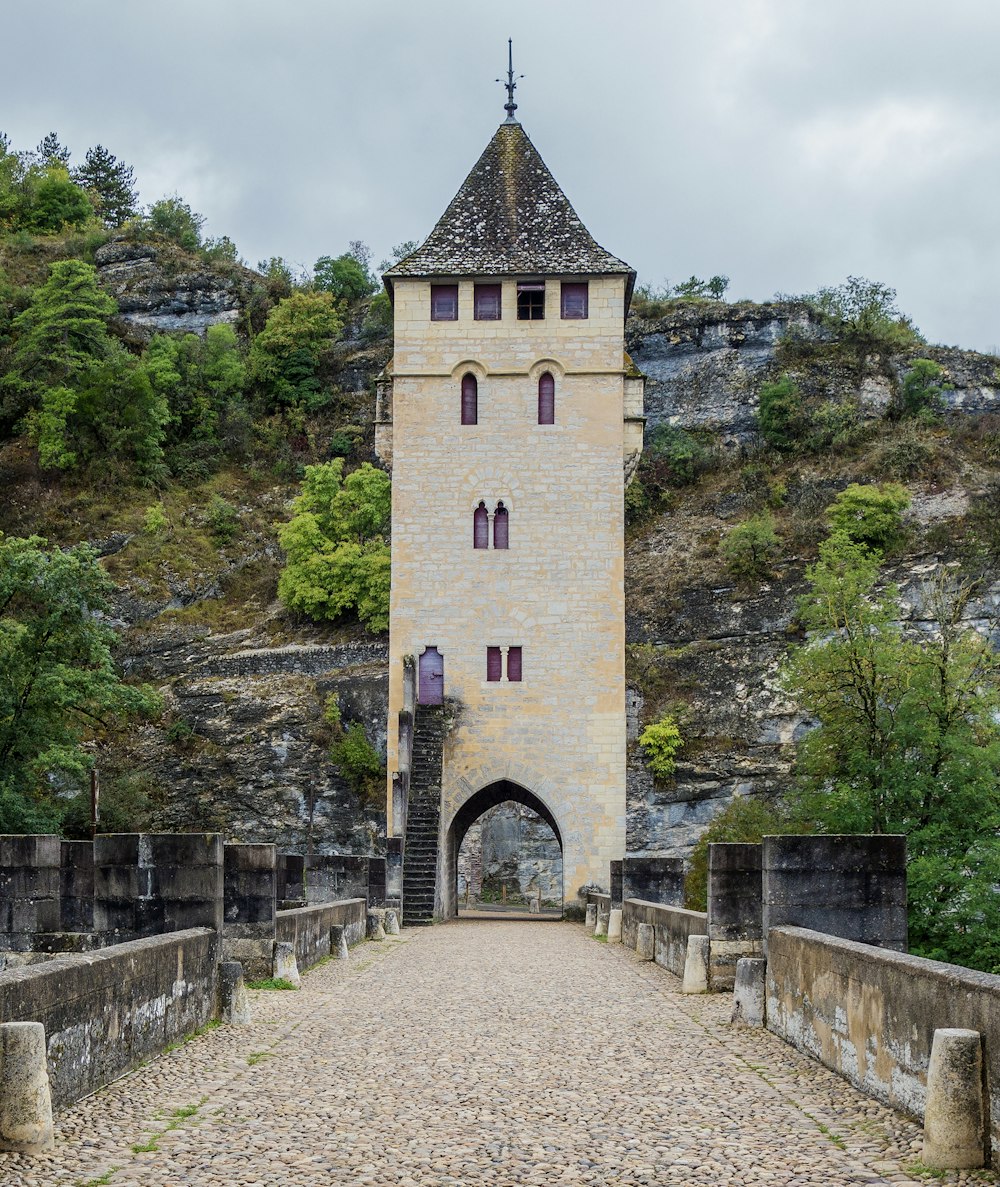 a tall tower with a clock on top of it