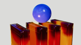 a blue ball sitting on top of a red box