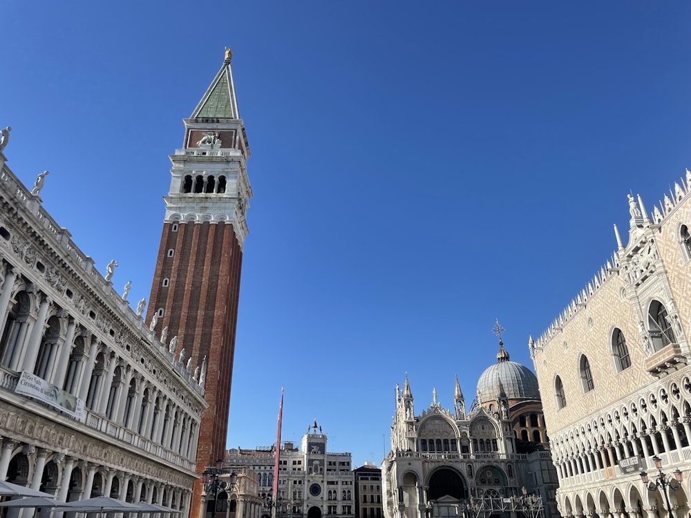 a tall clock tower towering over a city