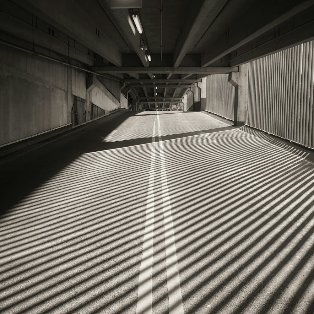 the shadows of a building on the ground