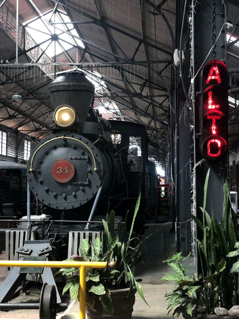 a train is parked inside of a building