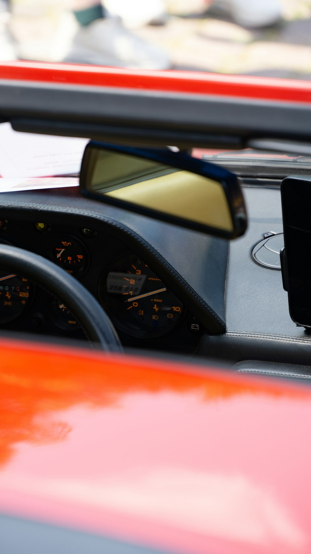 a close up of a car dashboard with a speedometer