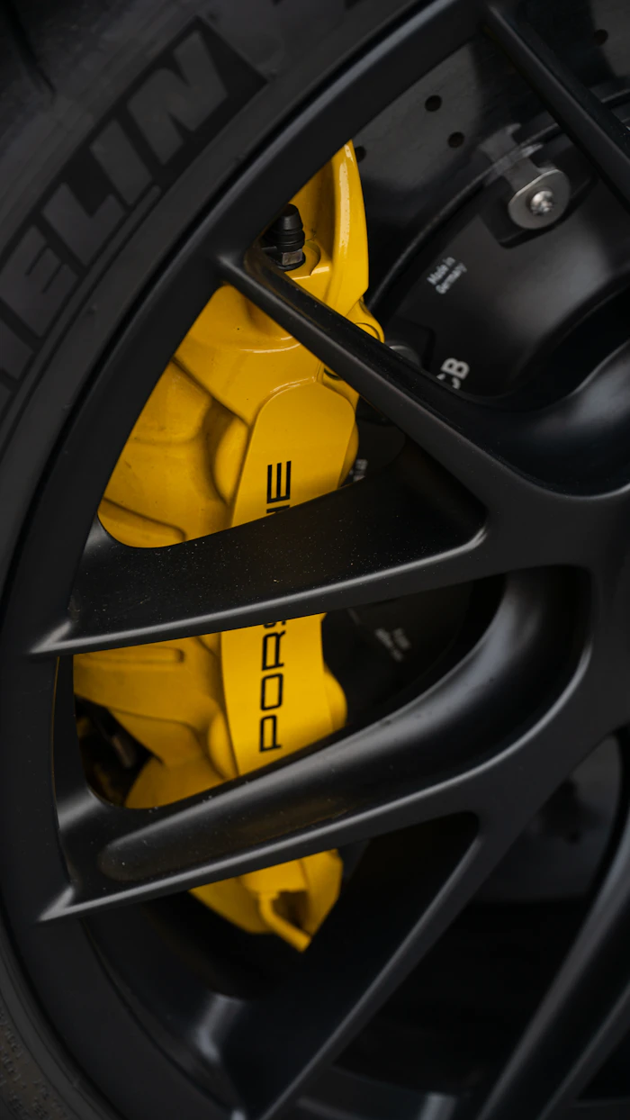 Sports car wheel with painted caliper