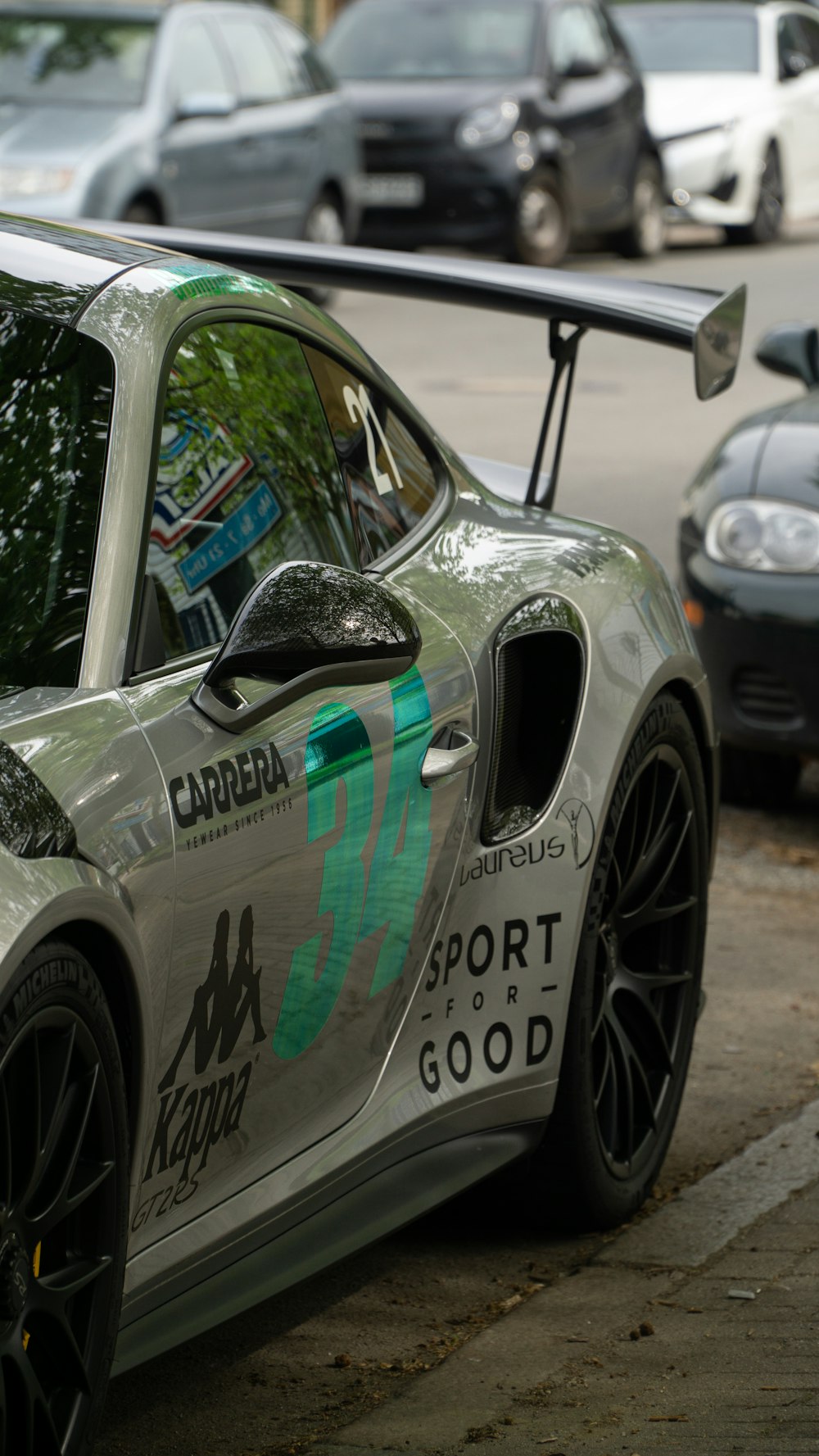 a sports car parked on the side of the road