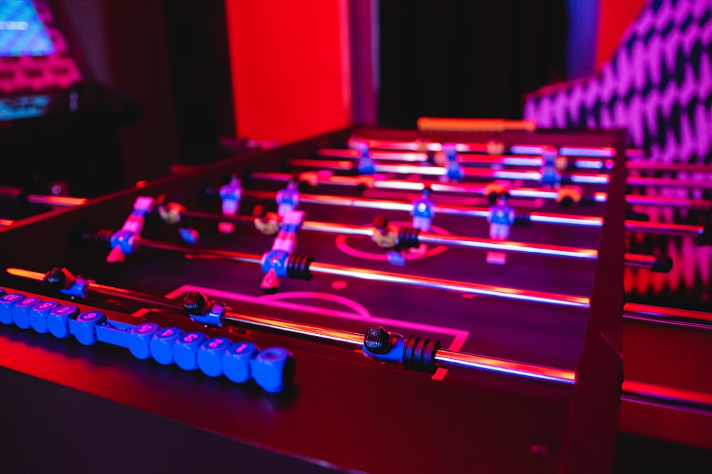 a close up of a foosball table in a room