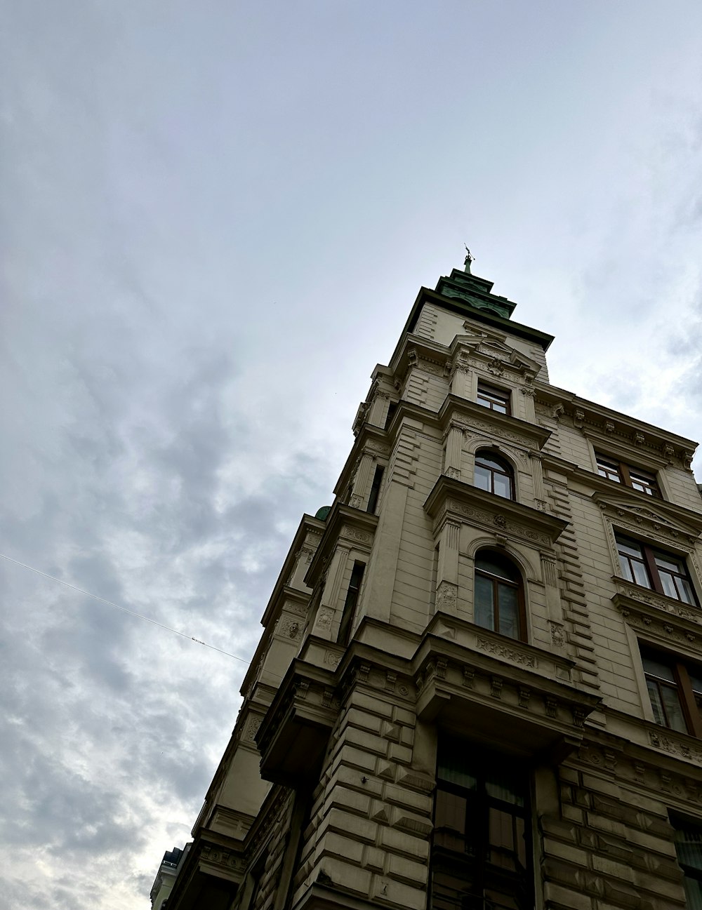 a tall building with a clock on the top of it