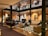 A cozy hotel lobby with warm lighting and comfortable seating.