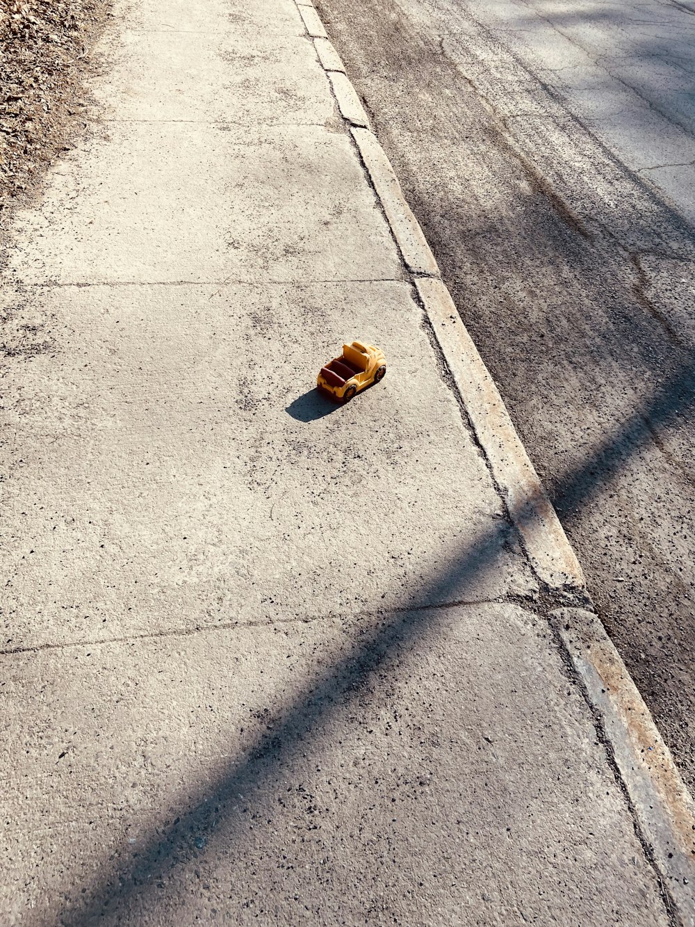 a shoe on the side of the road