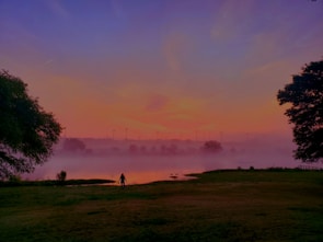 A serene sunset picture taken during a peaceful outdoor walk.