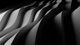 a black and white photo of wavy lines