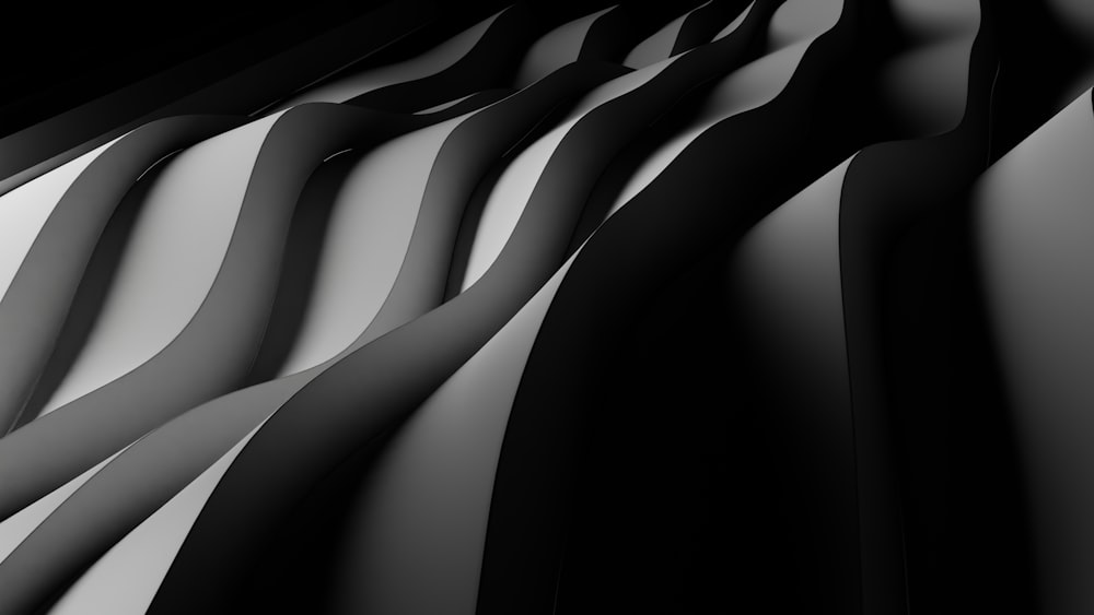 Une photo en noir et blanc de lignes ondulées
