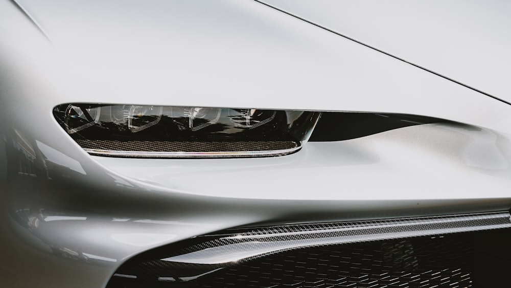 a close up of the front of a sports car