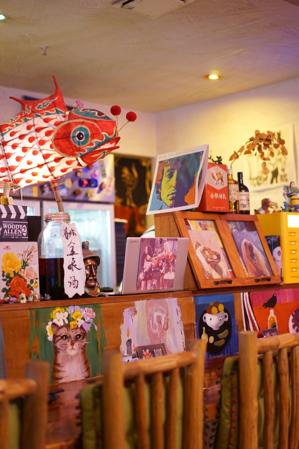a display of cards and paintings in a store