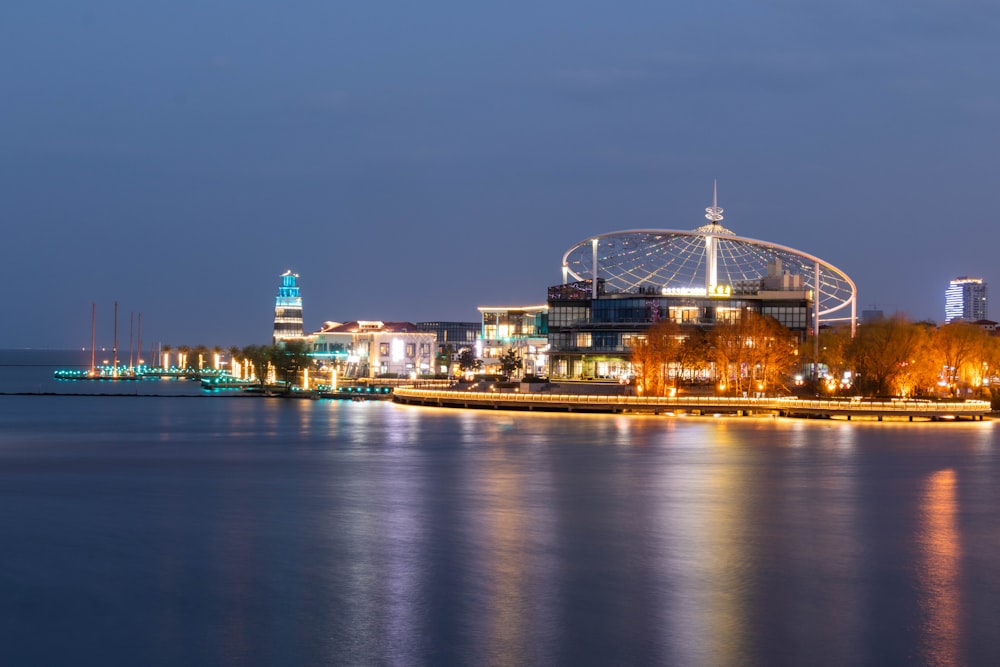 a view of a city at night from across the water