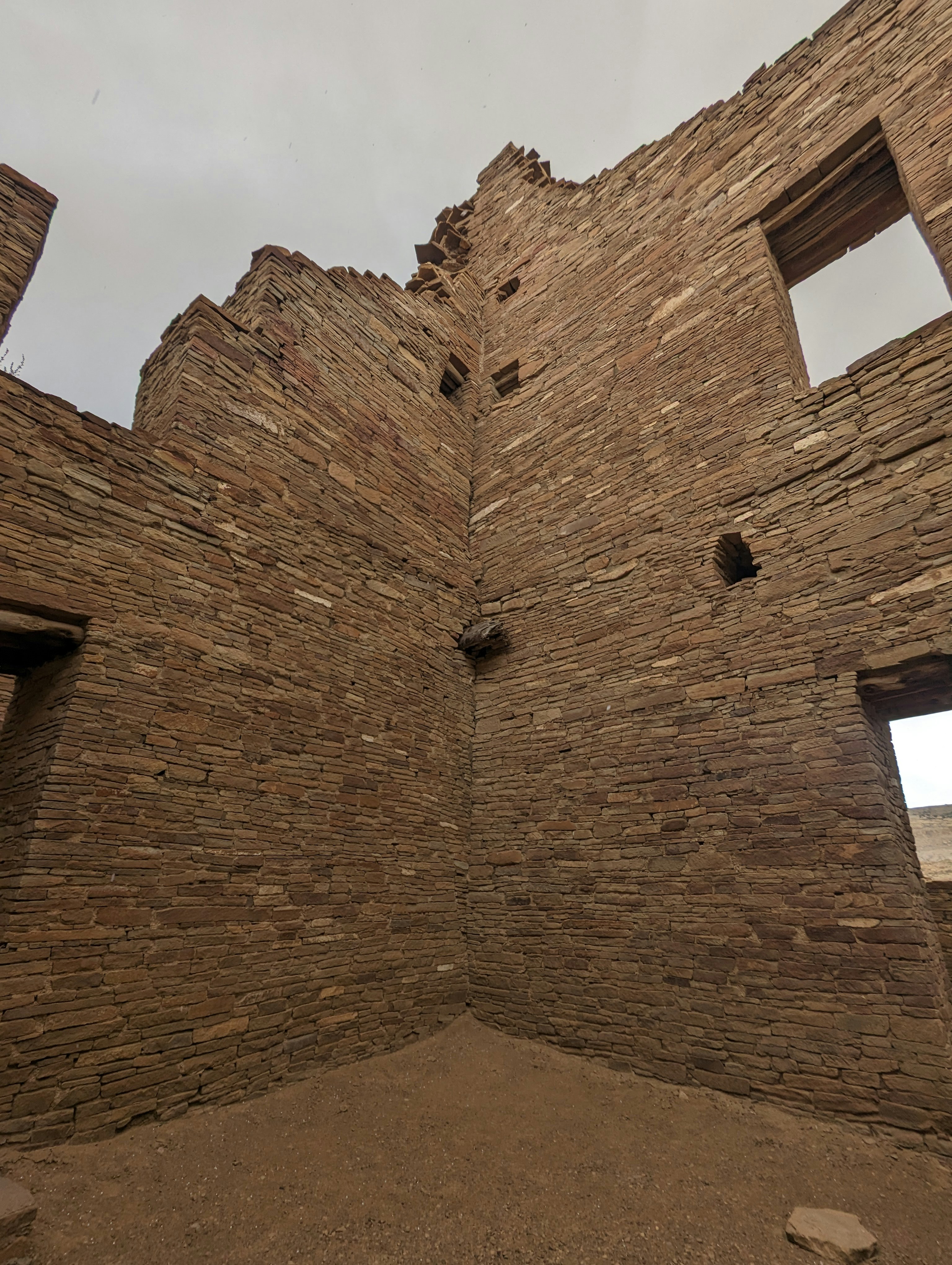 Ancient stone walls of Great Zimbabwe ruins with dramatic sky