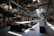 A professional industrial workspace with modern furniture and large format visual communication elements.