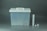 A translucent plastic storage container with a white lid featuring a handle is positioned on the left side. To the right of the container are a long cylindrical tube and two smaller cylindrical objects.