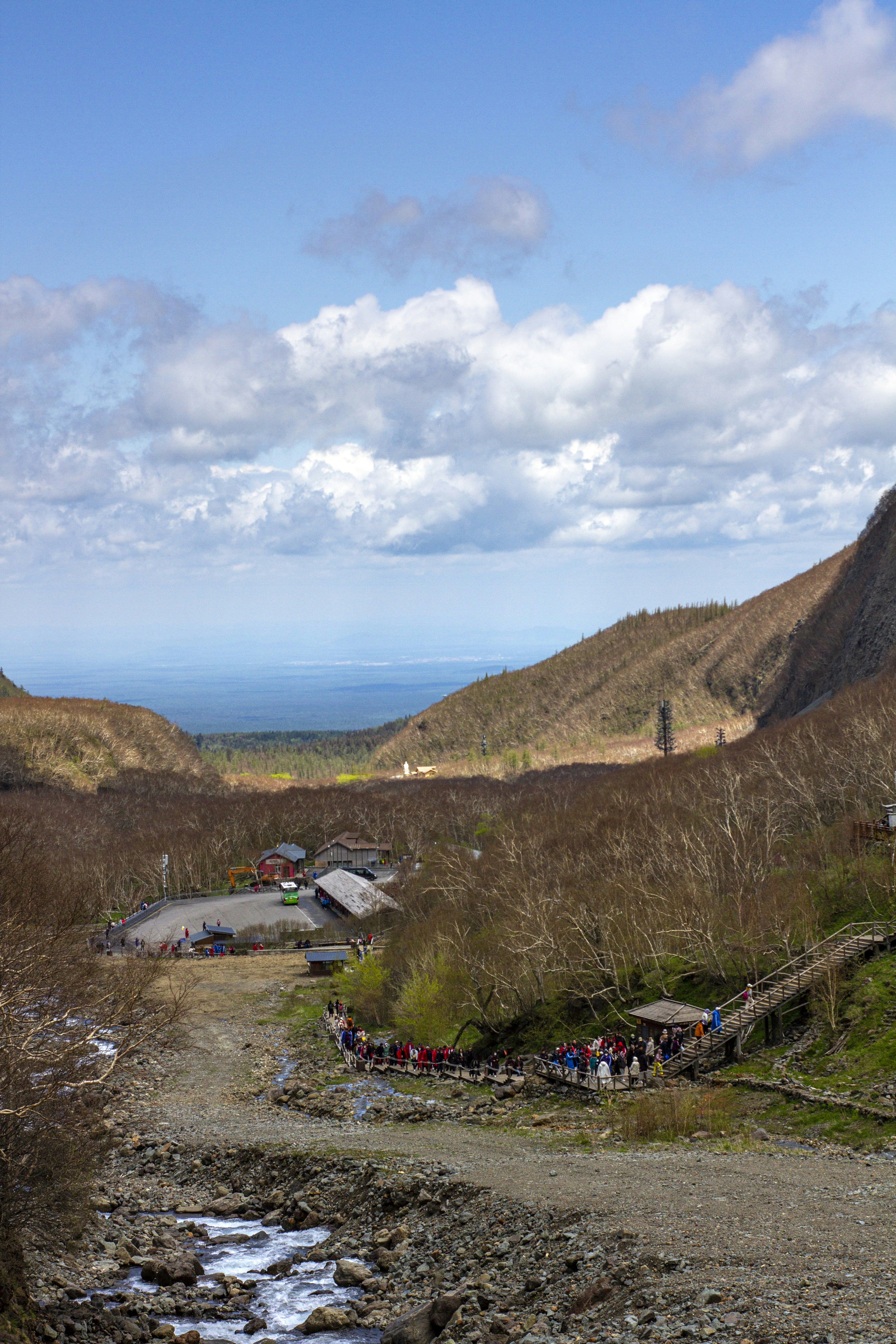 Tourism professional guiding visitors at scenic mountain destination