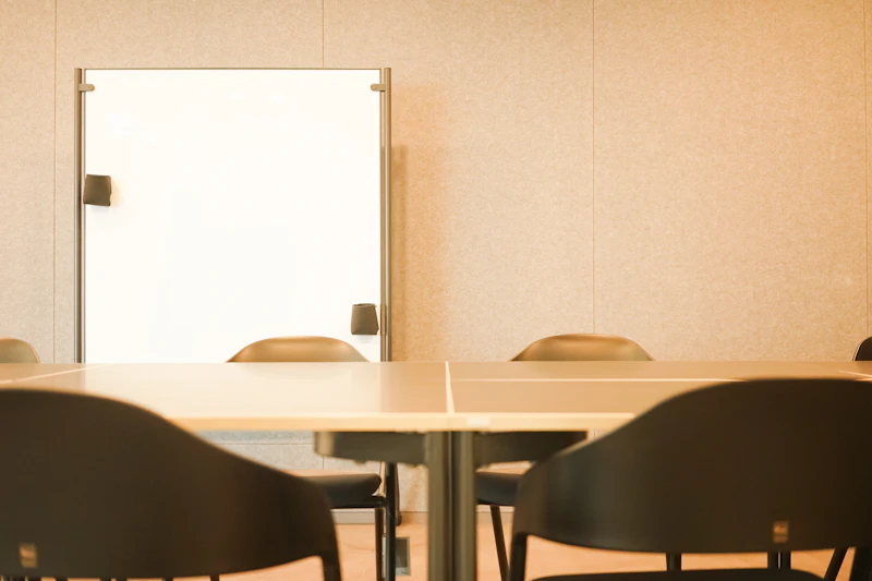 Elegant and organized executive boardroom, perfectly cleaned and arranged, showcasing professional maintenance