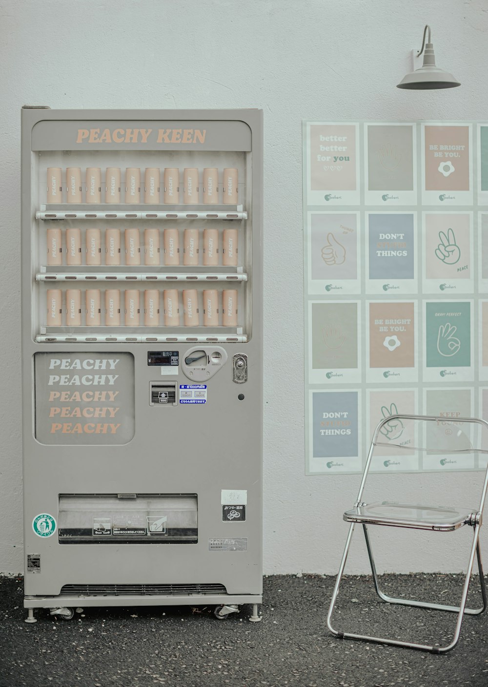 a chair sitting next to a vending machine