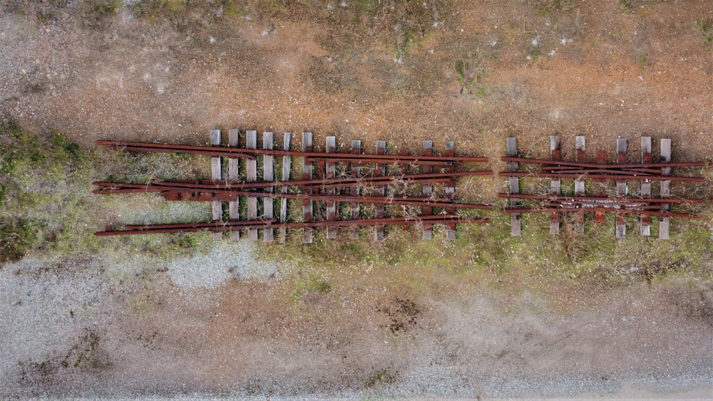 an aerial view of a train track in the middle of nowhere