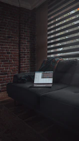 A thoughtful economist reviewing data charts in a cozy office setting.