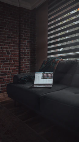 Sleek dark-themed office space with blue-violet gradient lighting highlighting a focused team analyzing marketing data.