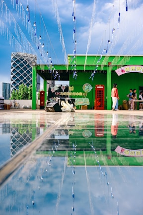 Outdoor LED totem standing tall with vibrant colors during an event.