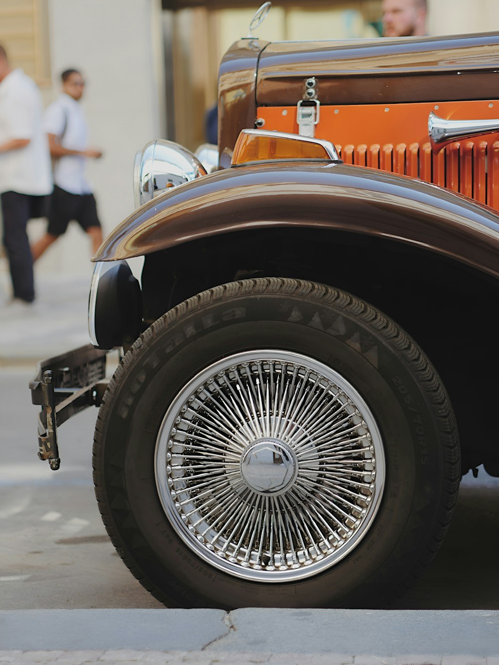 a close up of a car on a city street