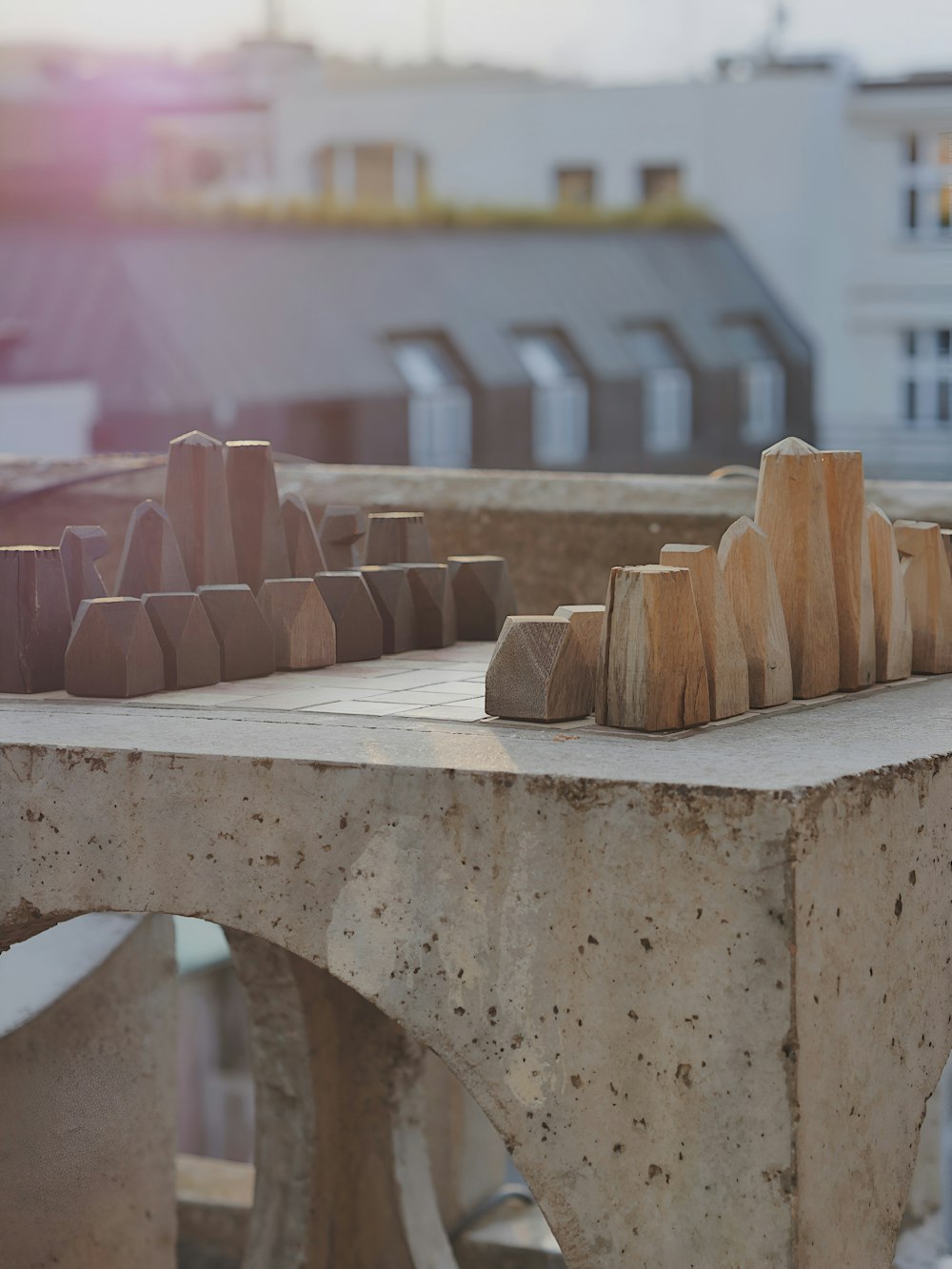 a cement bench with wooden blocks on top of it