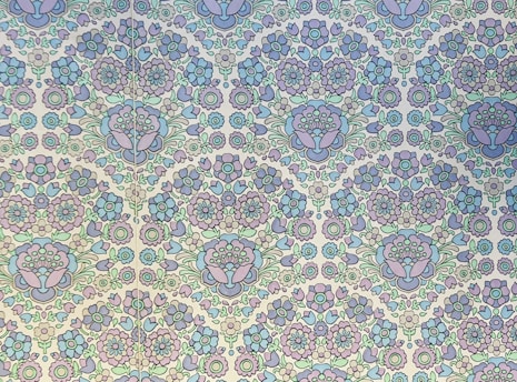 A close-up of a whimsical, hand-drawn floral pattern in soft pastel colors, perfect for wallpaper or fabric.