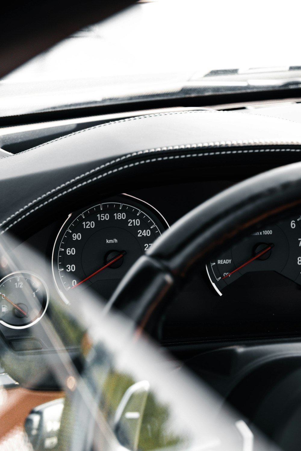 the dashboard of a car with a speedometer