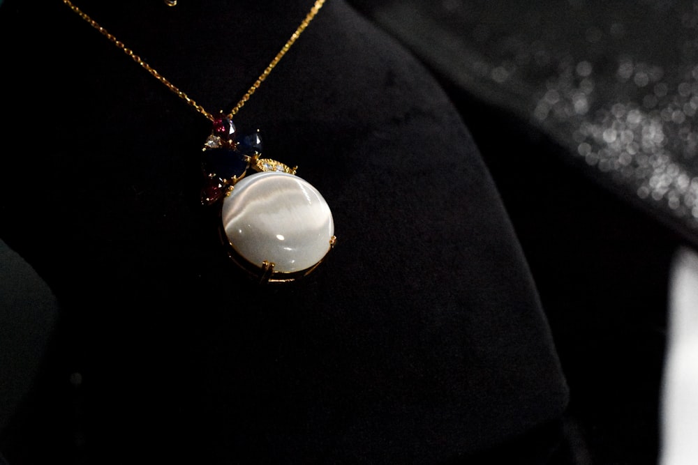 a close up of a necklace on a mannequin