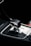 A close-up view of an automatic car gear shift surrounded by a sleek modern console.