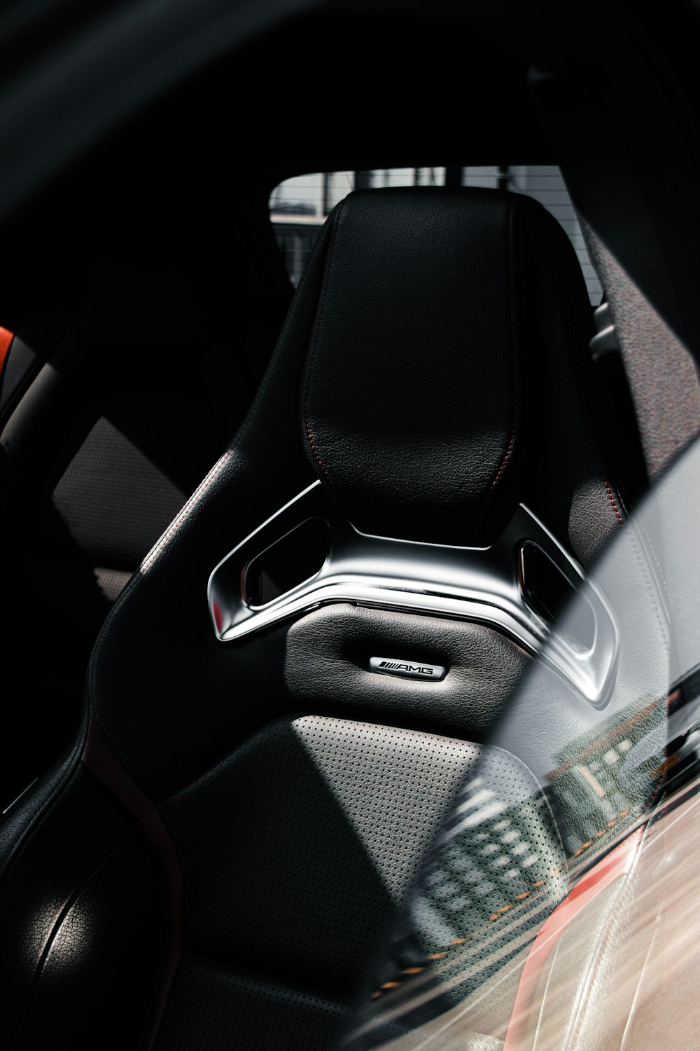 a close up of a car's interior with a steering wheel