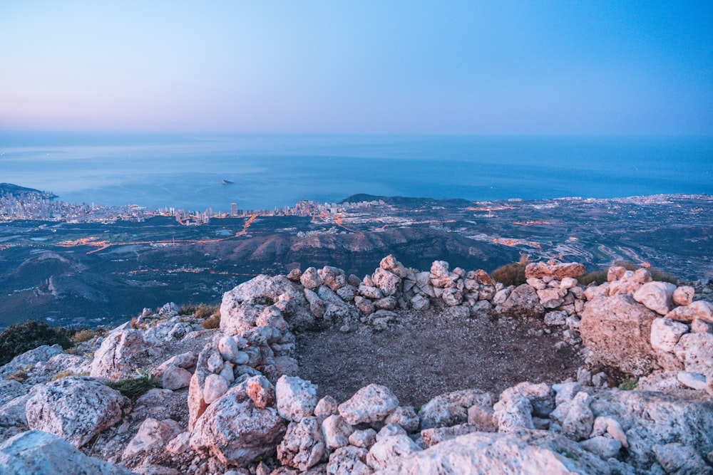 a view of a city from a mountain top