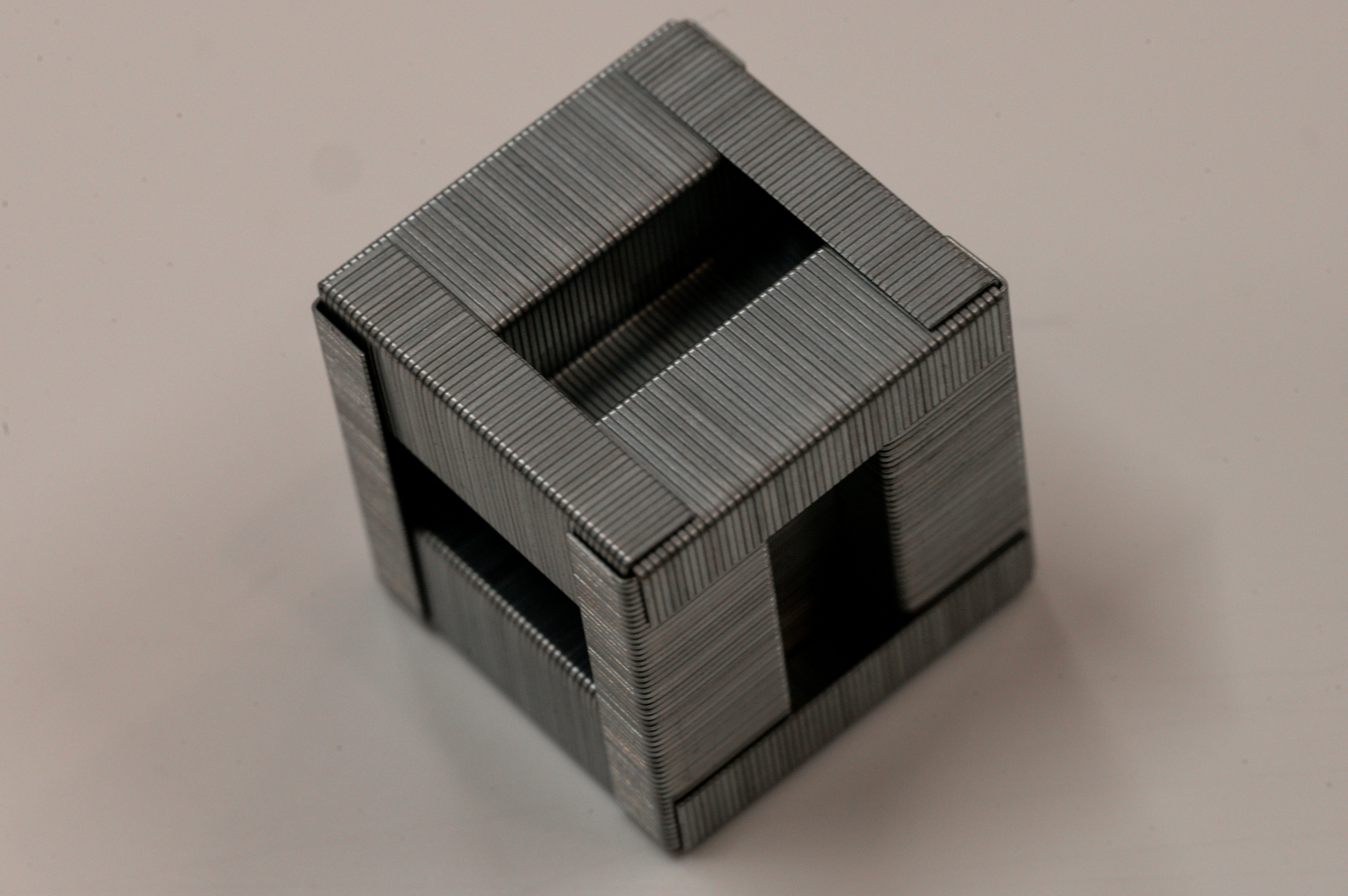 This object is made by assembling staples.